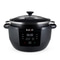 Schwarzer Instant Pot mit Glasdeckel und digitalem Bedienfeld.