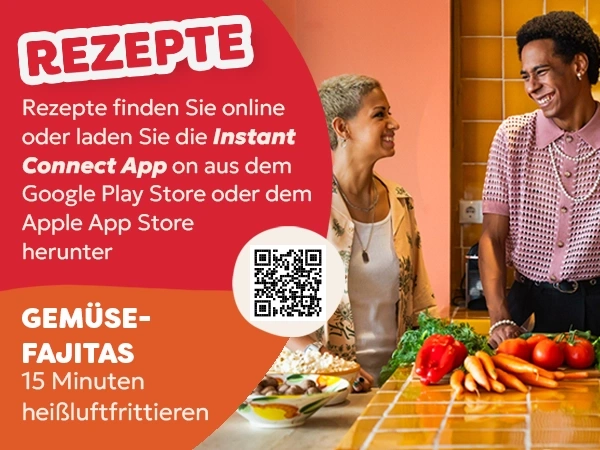 Zwei lachende Menschen bereiten Fajitas zu, ein Rezept für die Instant Connect App.